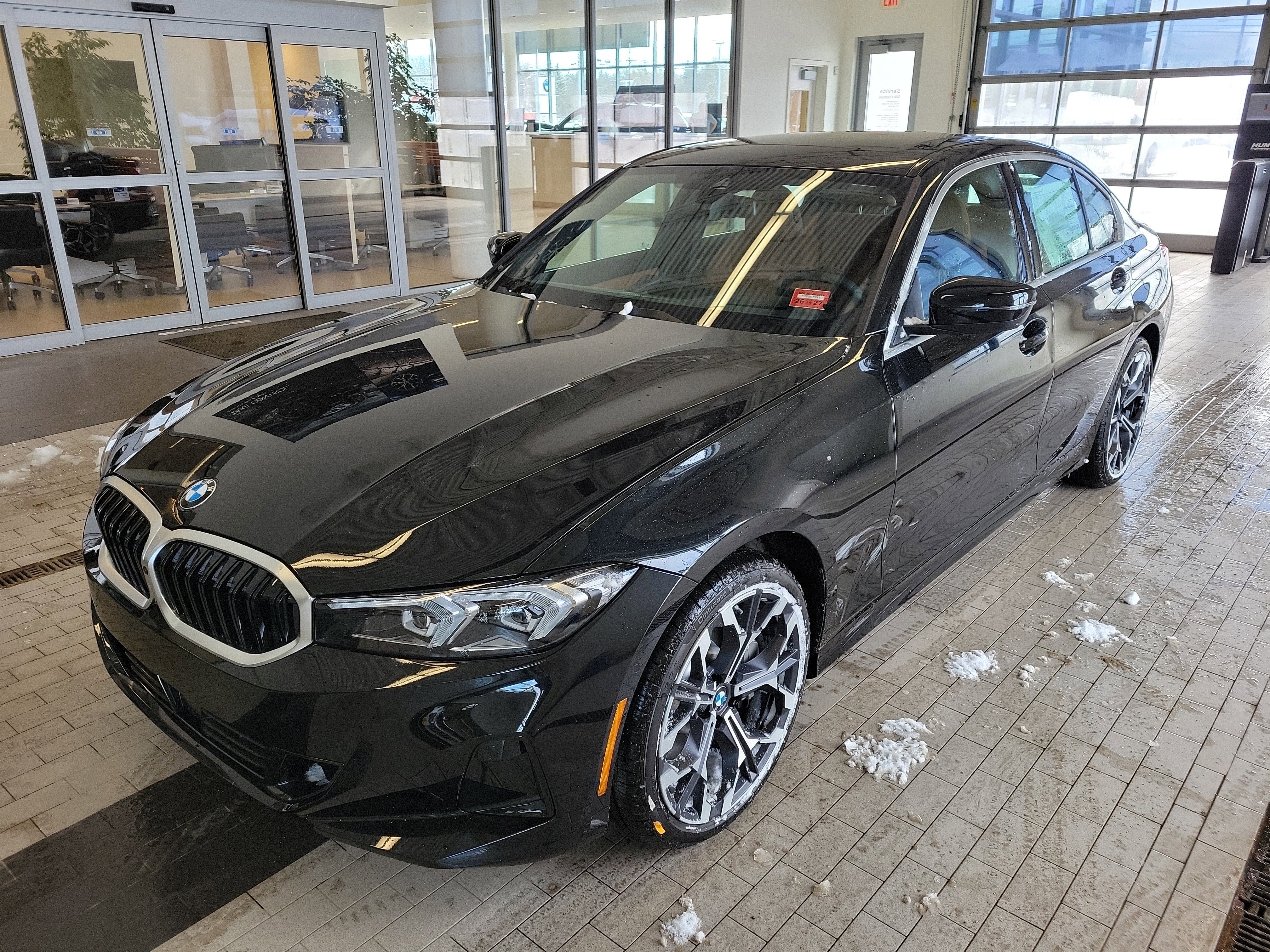 2026 BMW 3 Series 330i NA xDrive in Black Sapphire Metallic — front three-quarter view