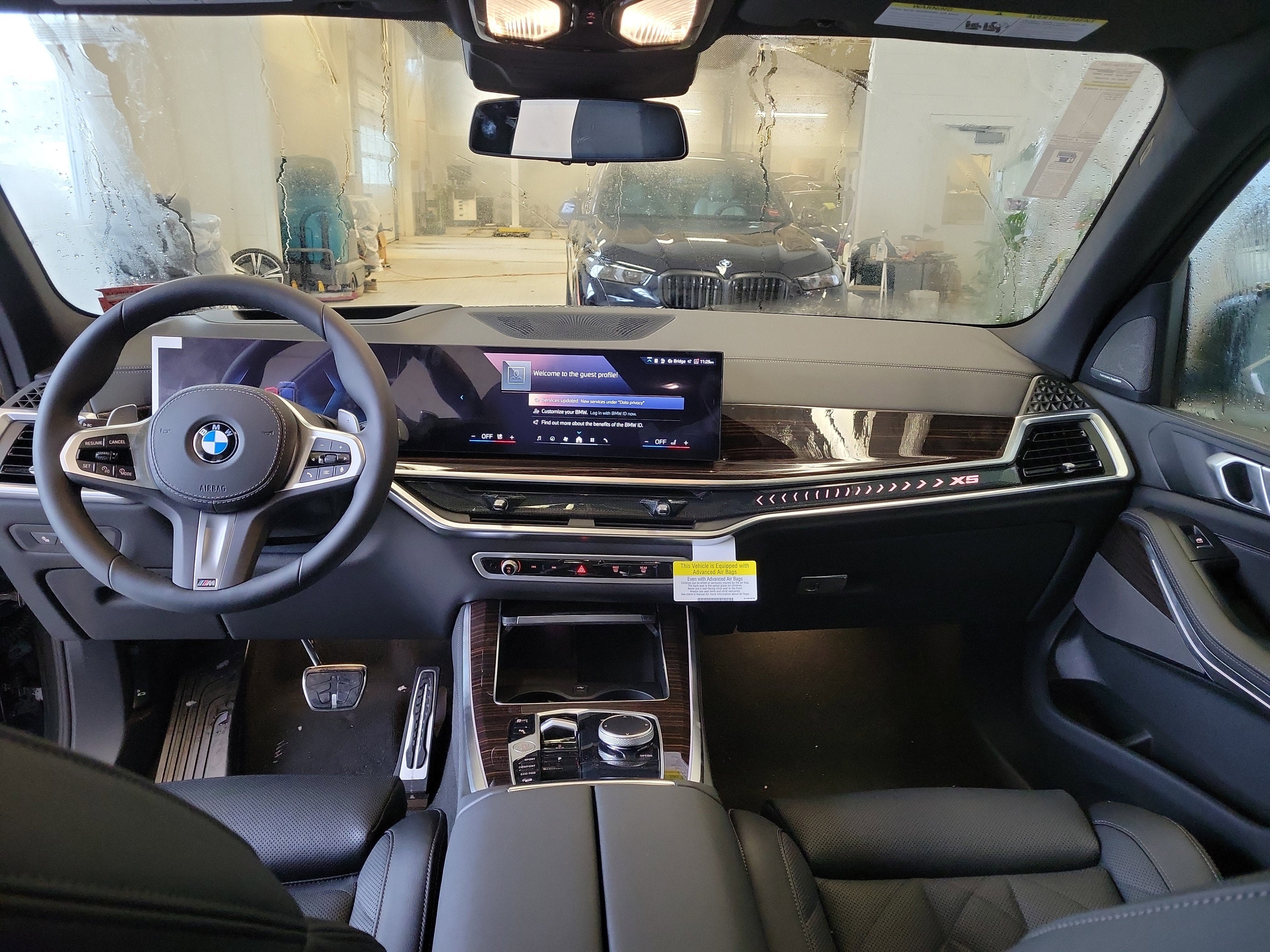 2026 BMW X5 — rear three-quarter view