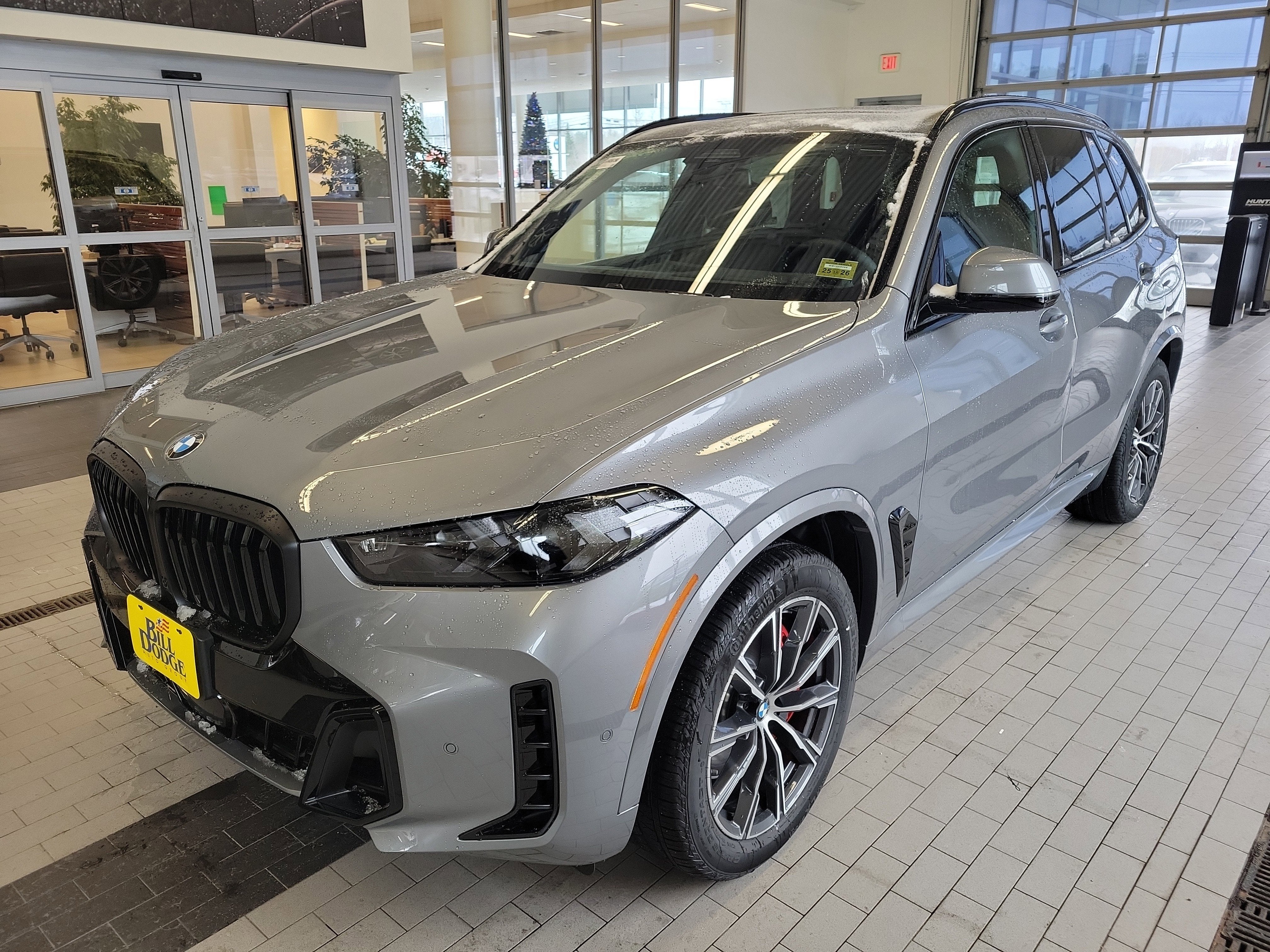2026 BMW X5 xDrive40i in Skyscraper Grey Metallic — front three-quarter view