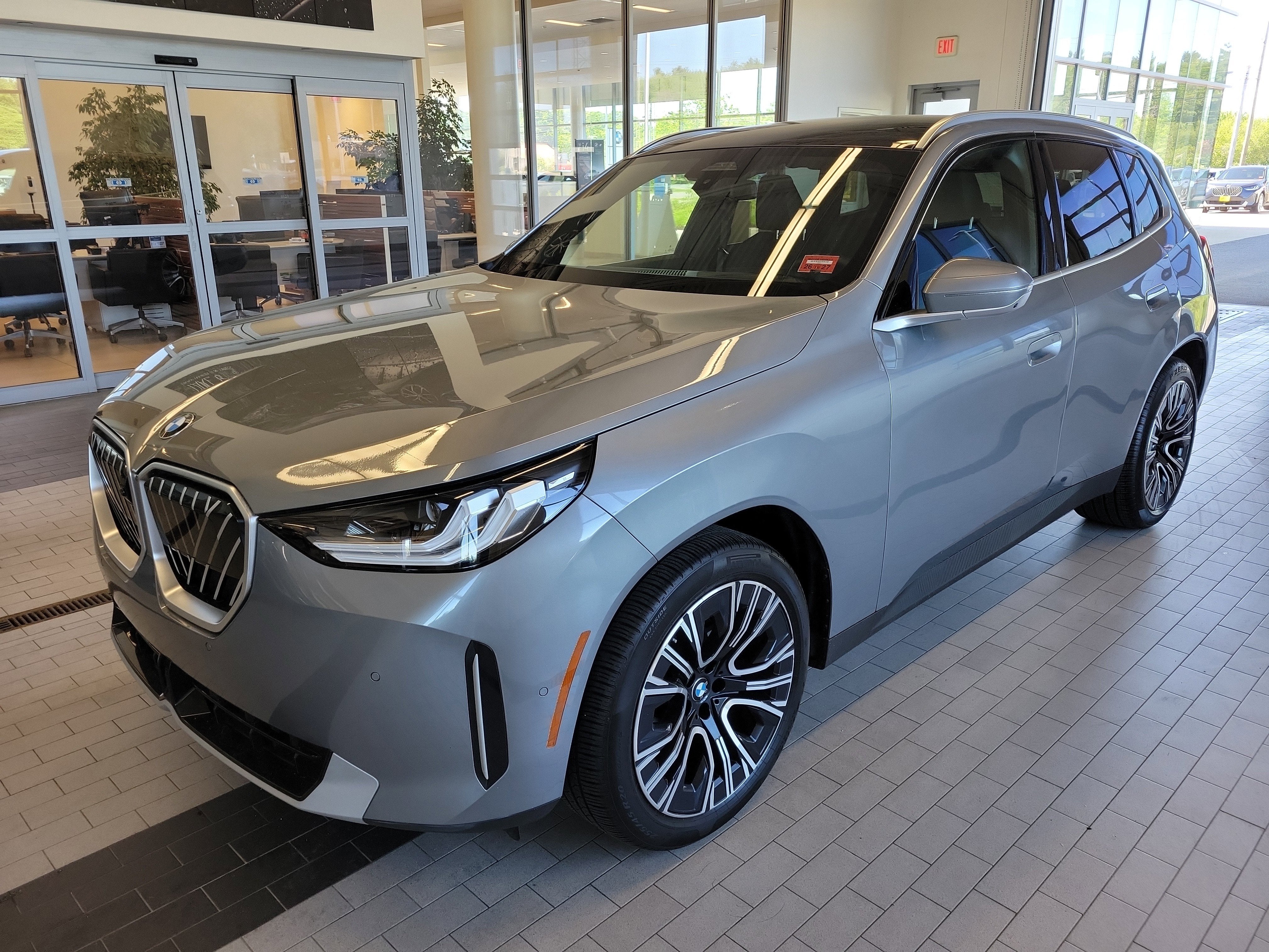 2025 BMW X3 30 xDrive in Frozen Deep Grey — front three-quarter view